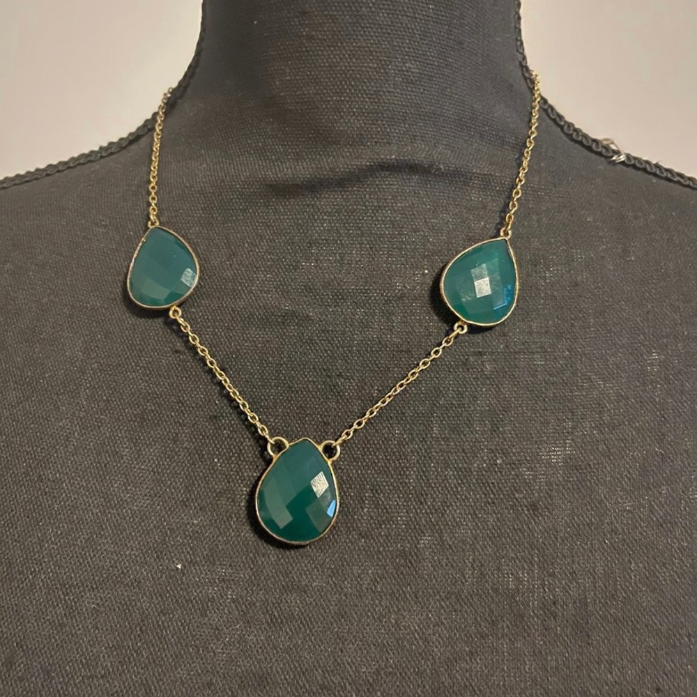 Gold and green necklaces